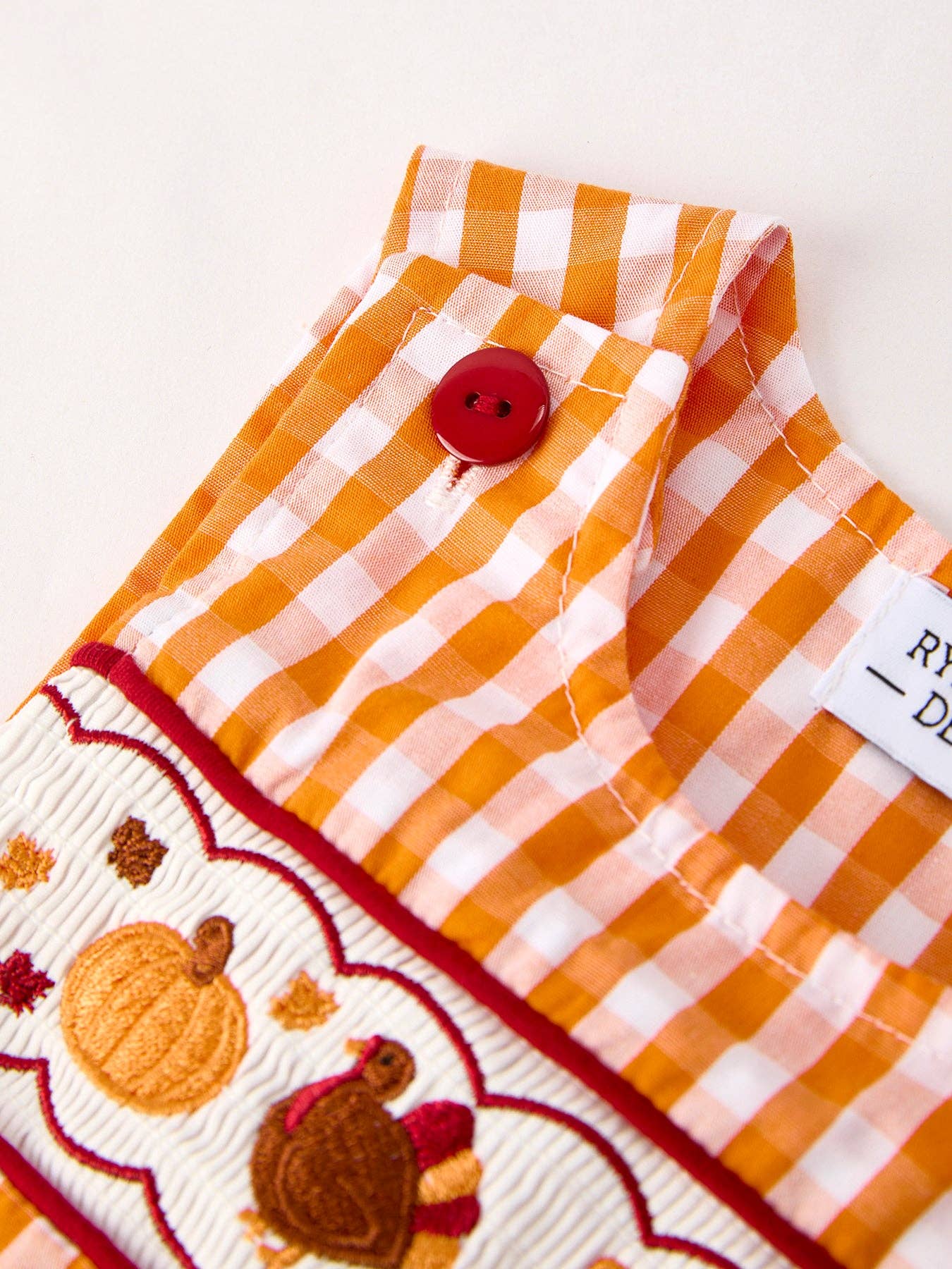 Fall Embroidered Romper for Baby Boys – Orange Checkered with Halloween Details